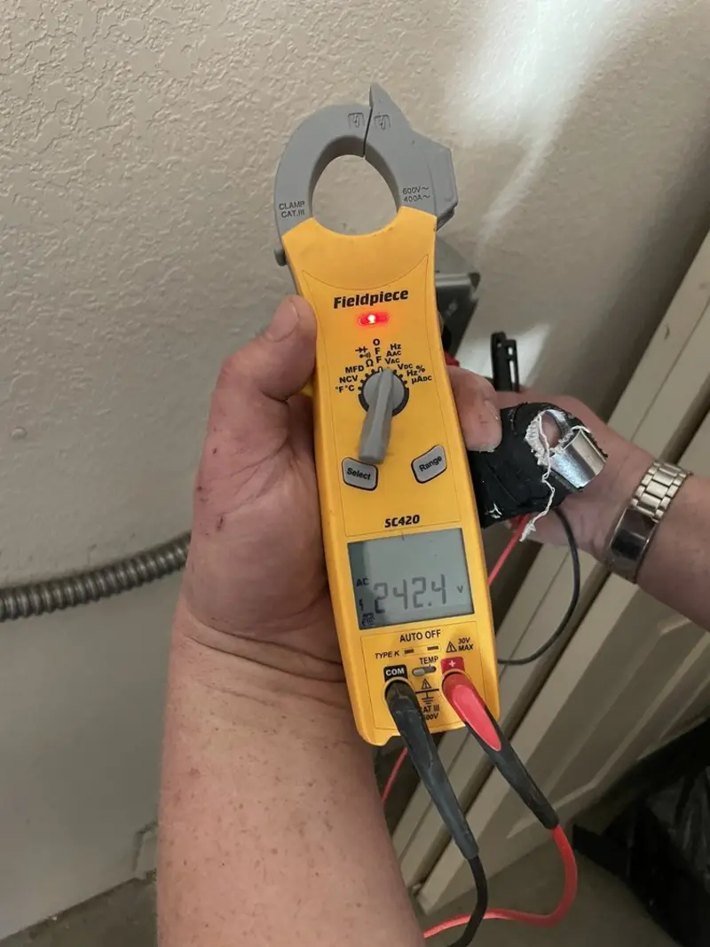 Voltage testing with clamp meter during Electrical Installation Services in Lincolnshire